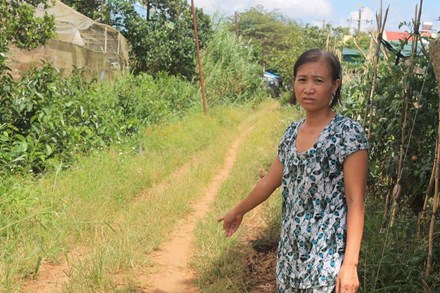 Tranh chấp đất đai, đổ nước chứa thuốc diệt cỏ vào miệng một phụ nữ - Ảnh 1. Tranh chấp đất đai, đổ nước chứa thuốc diệt cỏ vào miệng một phụ nữ - Ảnh 1.