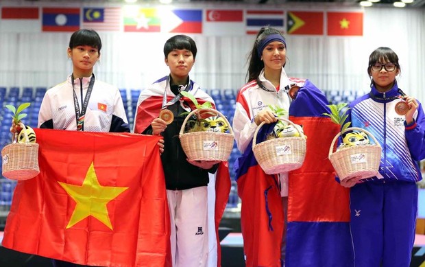 Vẻ đẹp lai của hot girl Taekwondo Campuchia gây sốt tại SEA Games 29 - Ảnh 2.