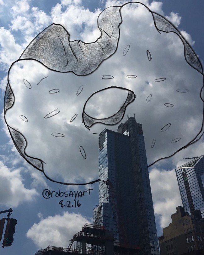 Họa sĩ vẽ tranh hoạt hình lên những đám mây - Ảnh 7.