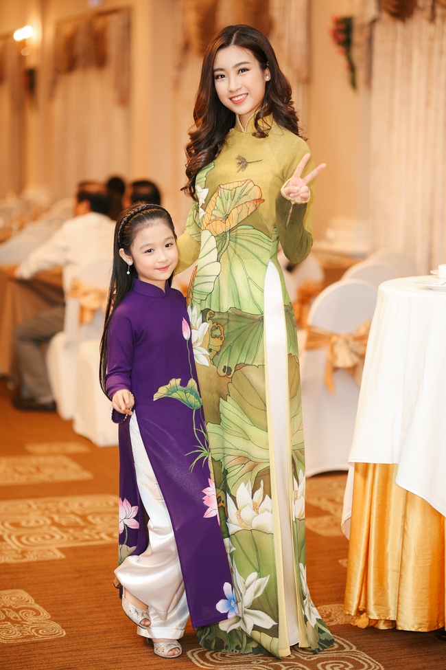 Hoa hậu Đỗ Mỹ Linh diện áo dài khoe nhan sắc trong họp báo - Ảnh 6.