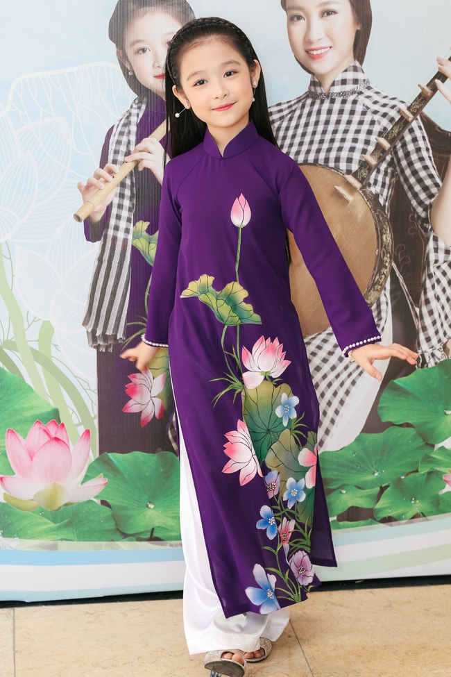 Hoa hậu Đỗ Mỹ Linh diện áo dài khoe nhan sắc trong họp báo - Ảnh 7.
