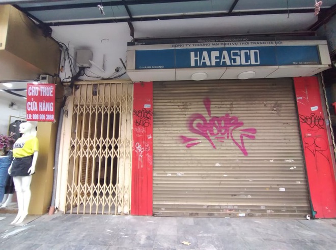 Ảnh hưởng dịch virus corona, hàng loạt cửa hàng phố cổ Hà Nội đóng cửa dừng hoạt động - Ảnh 7.