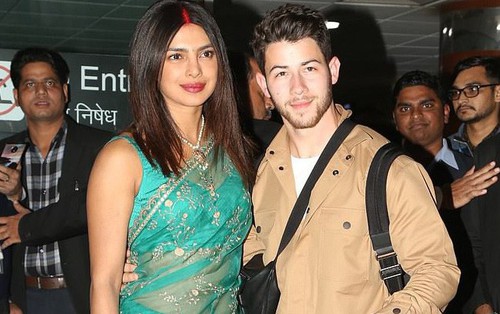 Nick Jonas và Hoa hậu Thế giới xuất hiện tình tứ tại sân bay sau "đám cưới thế kỷ" hoành tráng