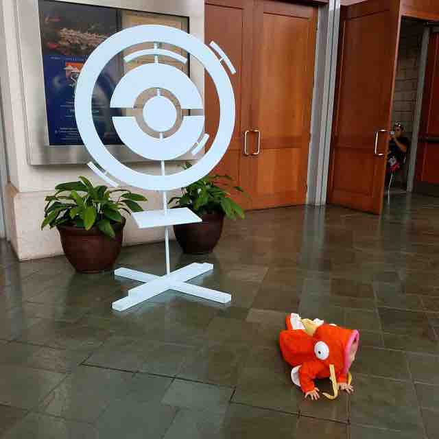 Forget No Face, because there's a baby with a super cute Magikarp cosplay!  - Photo 5.