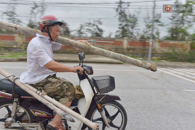 Người dân Nam Định gia cố nhà cửa, đắp bao tải cát trước nhà ứng phó với bão số 3 - Ảnh 3.