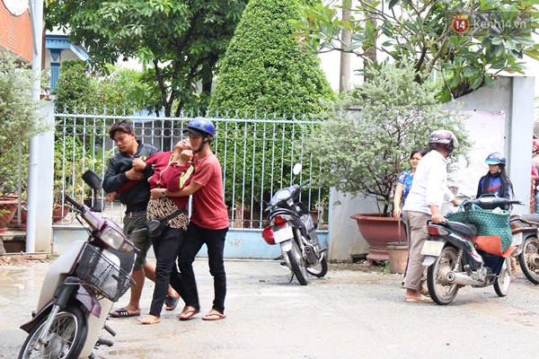 Vợ ngã quỵ bên thi thể chồng bị xe tải cán - Ảnh 3.