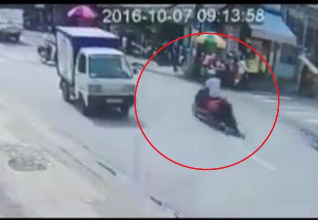 Bắt tên cướp kéo lê cô gái gần 100m trên đường phố Sài Gòn - Ảnh 1.
