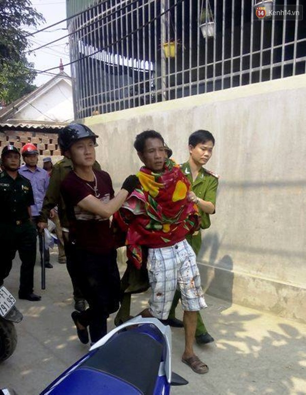 Tạm giữ h&igrave;nh sự nghi phạm d&ugrave;ng dao uy hiếp con tin ở Nghệ An - Ảnh 2.