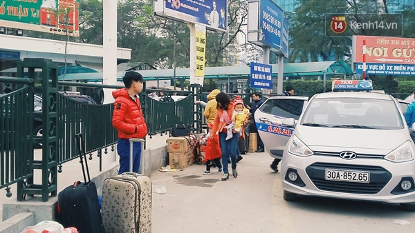 Người Hà Nội - Sài Gòn hối hả về quê nghỉ Tết sau buổi làm việc cuối cùng của năm - Ảnh 18.