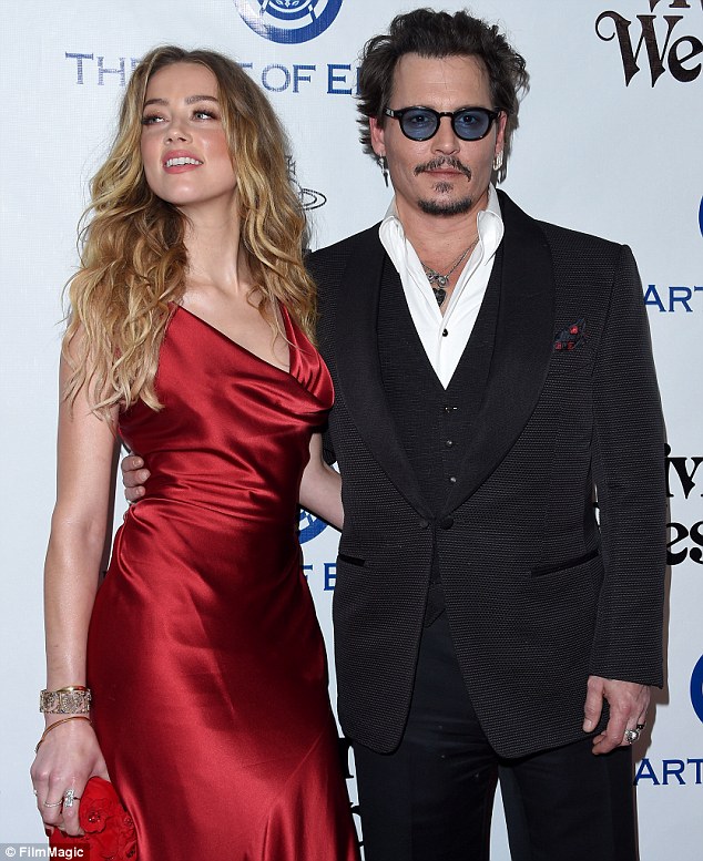 Amber Heard tung ảnh bầm mắt, tố Johnny Depp bạo hành mình - Ảnh 7.