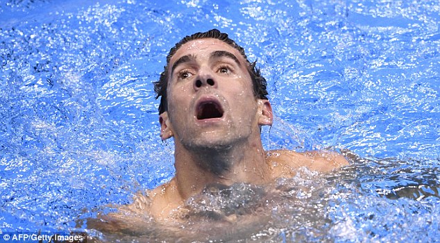 Kình ngư Singapore từng thua Hoàng Quý Phước đánh bại Michael Phelps để giành HCV Olympic - Ảnh 3.