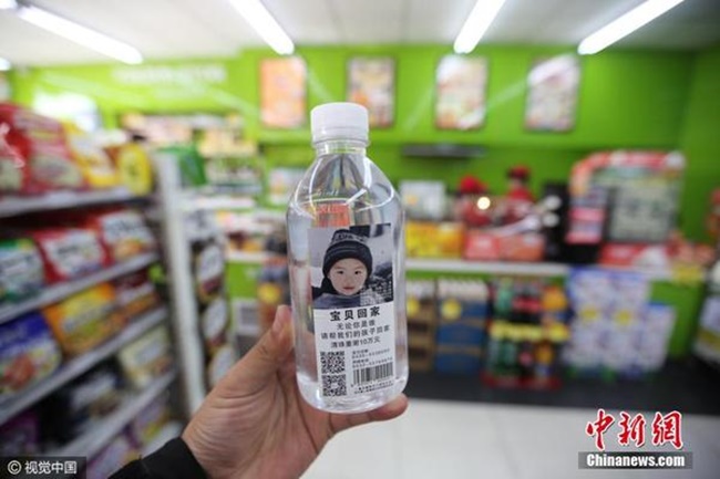 Thông điệp đầy ý nghĩa trên những chai nước khoáng in hình trẻ em bị mất tích ở Trung Quốc - Ảnh 6.