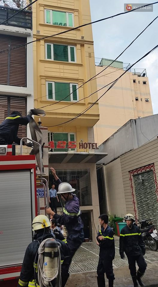 TP HCM: Cháy nhà cao tầng ở trung tâm quận 1, nhiều người hốt hoảng - Ảnh 7.