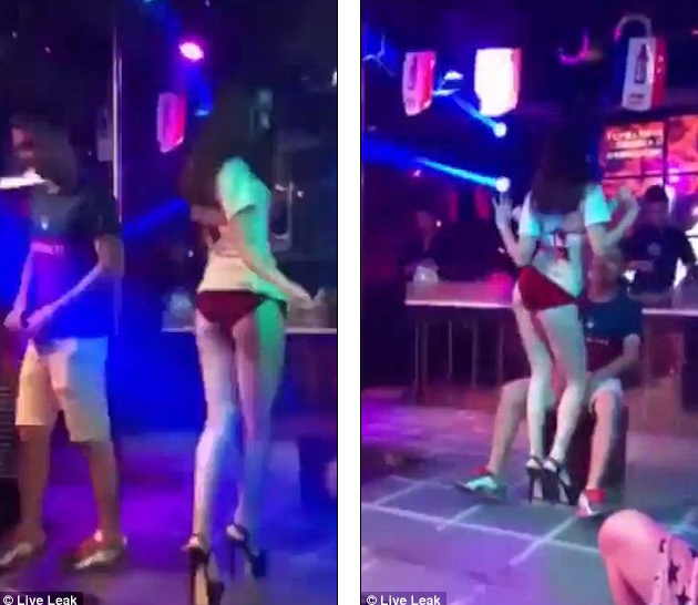 Ghen tuông, cô gái xông lên sân khấu xô ngã vũ nữ sexy rồi lôi người yêu xềnh xệch ra khỏi quán bar - Ảnh 2.