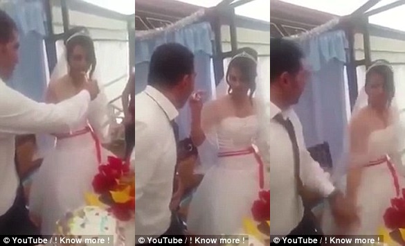 Video: Trêu đùa khi đút bánh cưới cho chồng, cô dâu bị chú rể tát ngay trong lễ cưới - Ảnh 2.