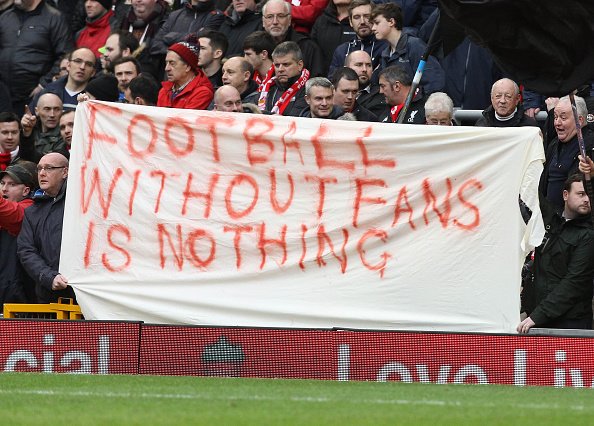 Liverpool tăng giá vé, fan bỏ dở trận đấu giữa chừng đi biểu tình - Ảnh 4.