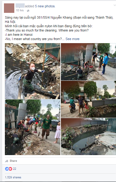 Hình ảnh nhóm người nước ngoài lội cống nước hôi thối dọn rác thải ở Hà Nội khiến nhiều người xấu hổ - Ảnh 1.