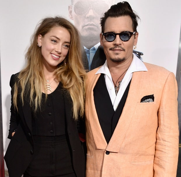 Hậu chia tay, Johnny Depp sửa hình xăm tên Amber Heard thành đồ cặn bã - Ảnh 3.