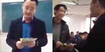 Clip th&acirc;̀y giáo nhà người ta lì xì sinh vi&ecirc;n trong ti&ecirc;́t học đ&acirc;̀u năm mới - Ảnh 2.