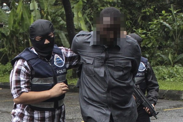 Malaysia bắt giữ 7 đối tượng tình nghi là thành viên IS - Ảnh 1.