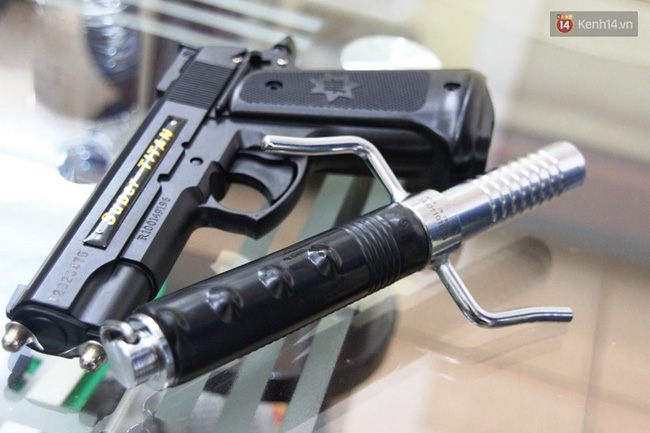Khẩu súng giám đốc công ty bảo vệ sử dụng là công cụ hỗ trợ được cấp phép - Ảnh 3.