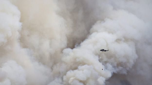  Gần 1.600 ngôi nhà cháy rụi trong biển lửa ở Canada  - Ảnh 6.