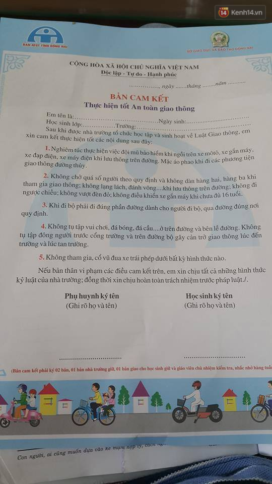Bắt học sinh lớp 1 ký cam kết an toàn giao thông - Ảnh 1. Bắt học sinh lớp 1 ký cam kết an toàn giao thông - Ảnh 1.