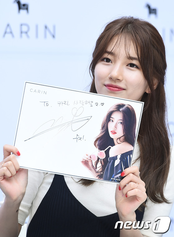 Tóc rối bời tự nhiên, Suzy lại tiếp tục xinh đẹp “gây thương nhớ” - Ảnh 12.