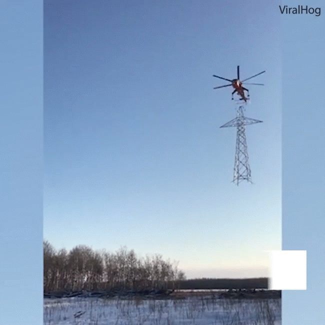 Đỉnh cao của nghệ thuật xếp hình: Anh phi công trực thăng lắp ghép tháp điện khổng lồ nhẹ nhàng như đẩy xe hàng - Ảnh 2.
