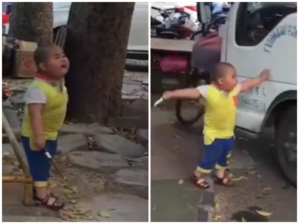 Trung Quốc: Cậu bé 5 tuổi cầm dao uy hiếp nữ tài xế ngay ở chốn đông người - Ảnh 2.