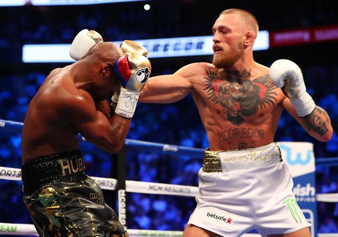 Mayweather không đấm gục McGregor vì sợ đối thủ vỡ não - Ảnh 1.