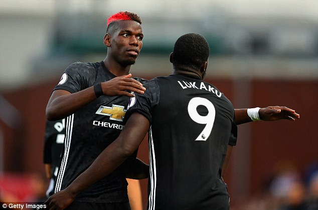 Pogba bị chê là trẻ trâu với mái tóc nhuộm đỏ - Ảnh 2.