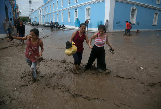 Chùm ảnh: Xót xa trước cảnh tượng tan hoang của Peru sau trận lũ lịch sử - Ảnh 13.