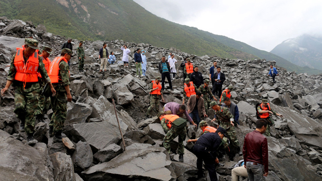 Vụ lở đất tại Trung Quốc: Công bố danh tính của 118 người còn mất tích - Ảnh 1.