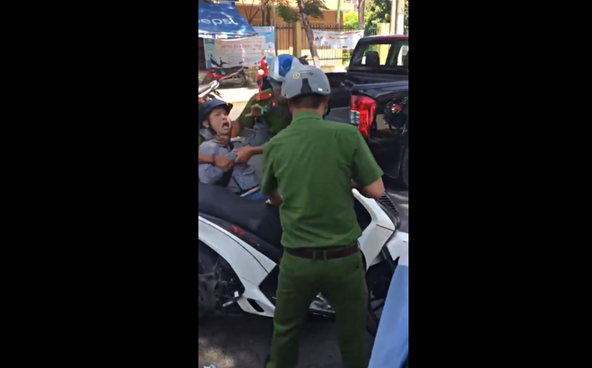 Sự thật clip “công an cưỡng chế nam thanh niên đi xe SH ở Đà Nẵng” - Ảnh 1.