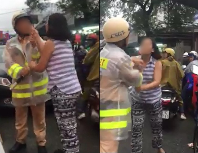 Clip gây phẫn nộ: Người phụ nữ vi phạm luật giao thông chửi bới, thóa mạ chiến sĩ CSGT trên phố Sài Gòn - Ảnh 3.