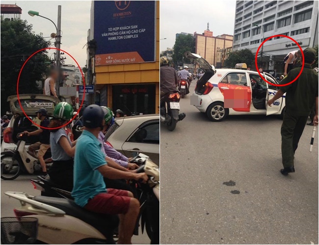 Hà Nội: Đi vào đường cấm bị CSGT nhắc nhở, tài xế taxi leo lên nóc ô tô ăn vạ - Ảnh 1.