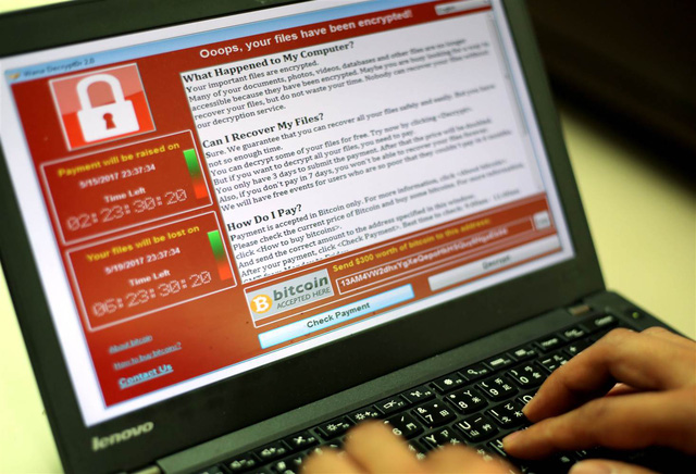 Máy tính bị nhiễm mã độc WannaCry, đây là những gì bạn cần phải làm - Ảnh 1.