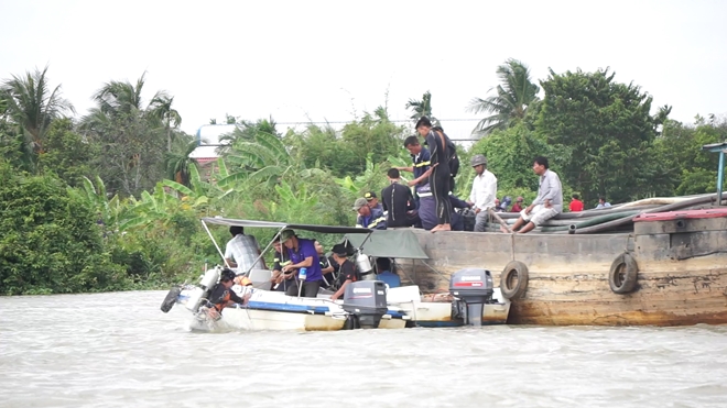 Tìm thấy thi thể hai mẹ con mất tích trên sông Sài Gòn - Ảnh 1.