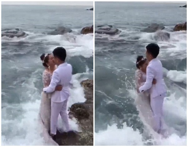 Clip: Ra biển chụp ảnh cưới, đôi trẻ bị sóng lớn hạ đo ván đến thảm hại - Ảnh 1.