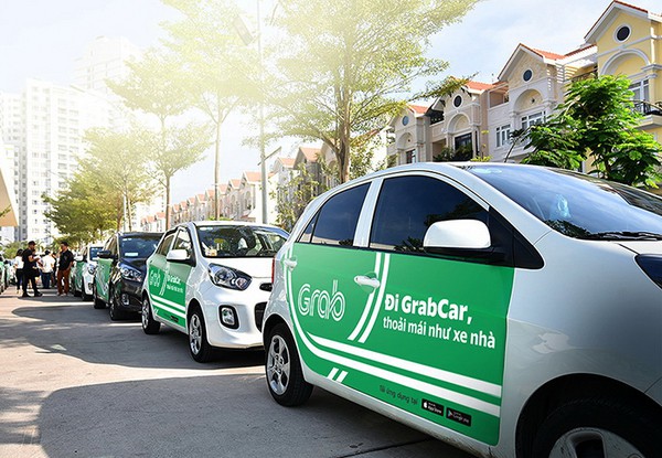 Sinh ra trên GrabCar ở Sài Gòn, em bé và cha mẹ được đi miễn phí taxi 4 năm - Ảnh 1.