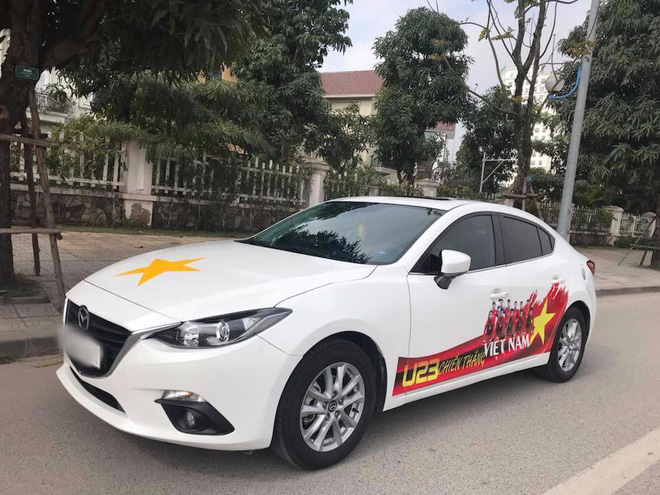 Chùm ảnh: Những chiếc xe mang màu cờ sắc áo tràn ngập phố phường trước trận chung kết của U23 Việt Nam - Ảnh 3.