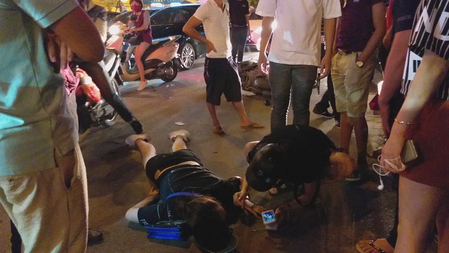 Hà Nội: Cô gái đi xe máy bị ô tô cố vượt đèn đỏ đâm trọng thương - Ảnh 5.