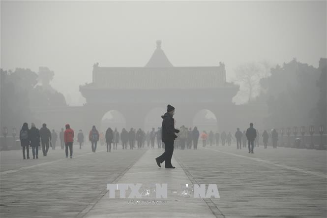 Thủ đô Bắc Kinh ban bố lệnh báo động vàng về ô nhiễm không khí - Ảnh 1. Thủ đô Bắc Kinh ban bố lệnh báo động vàng về ô nhiễm không khí - Ảnh 1.