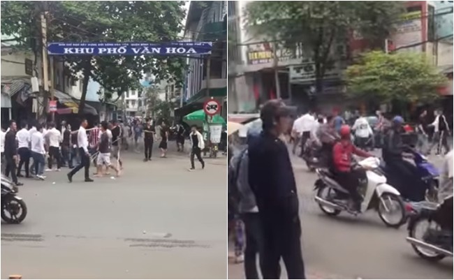 Hai nhóm giang hồ cầm hung khí đuổi chém nhau giữa ban ngày ở Sài Gòn - Ảnh 2.