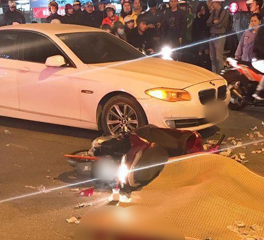 Hà Nội: Va chạm mạnh với xe BMW ngã xuống đường, cô gái bị xe buýt cán tử vong - Ảnh 1.
