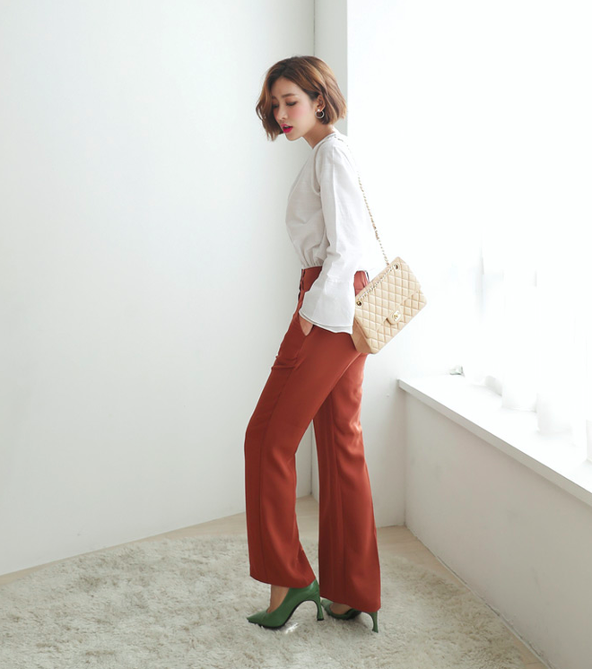 Đây chính là lý do vì sao quần vải đang dần “chiếm chỗ” của quần jeans trong tủ đồ của các nàng - Ảnh 17.