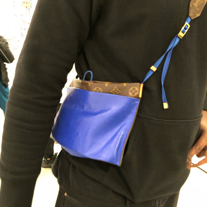 Đố bạn: Tìm sự khác biệt giữa mẫu túi mới của Louis Vuitton với túi đựng áo mưa - Ảnh 4.
