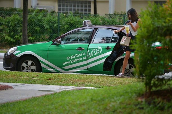 Hà Nội: Người phụ nữ tố bị tài xế GrabCar đe dọa, lao vào định hành hung - Ảnh 2.