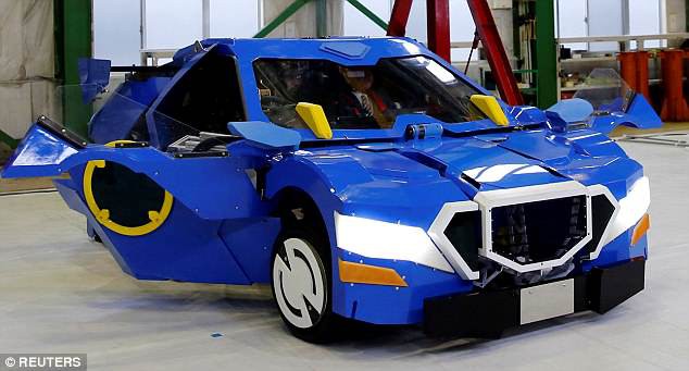 Cuối cùng cũng có Transformer ngoài đời thực, biến hóa ô-tô thành robot ảo như phim - Ảnh 1.
